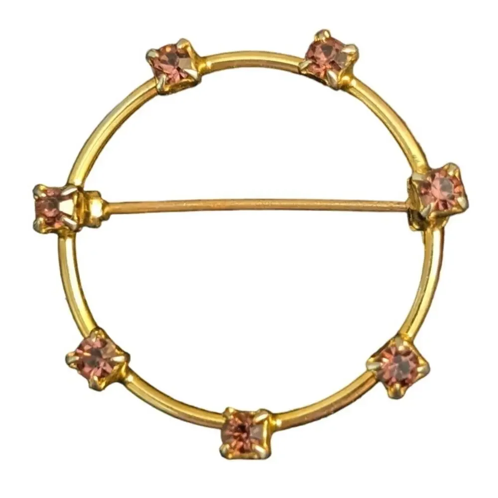 Vintage Gold Tone Circle Brooch W/ Purple Colored Crystals